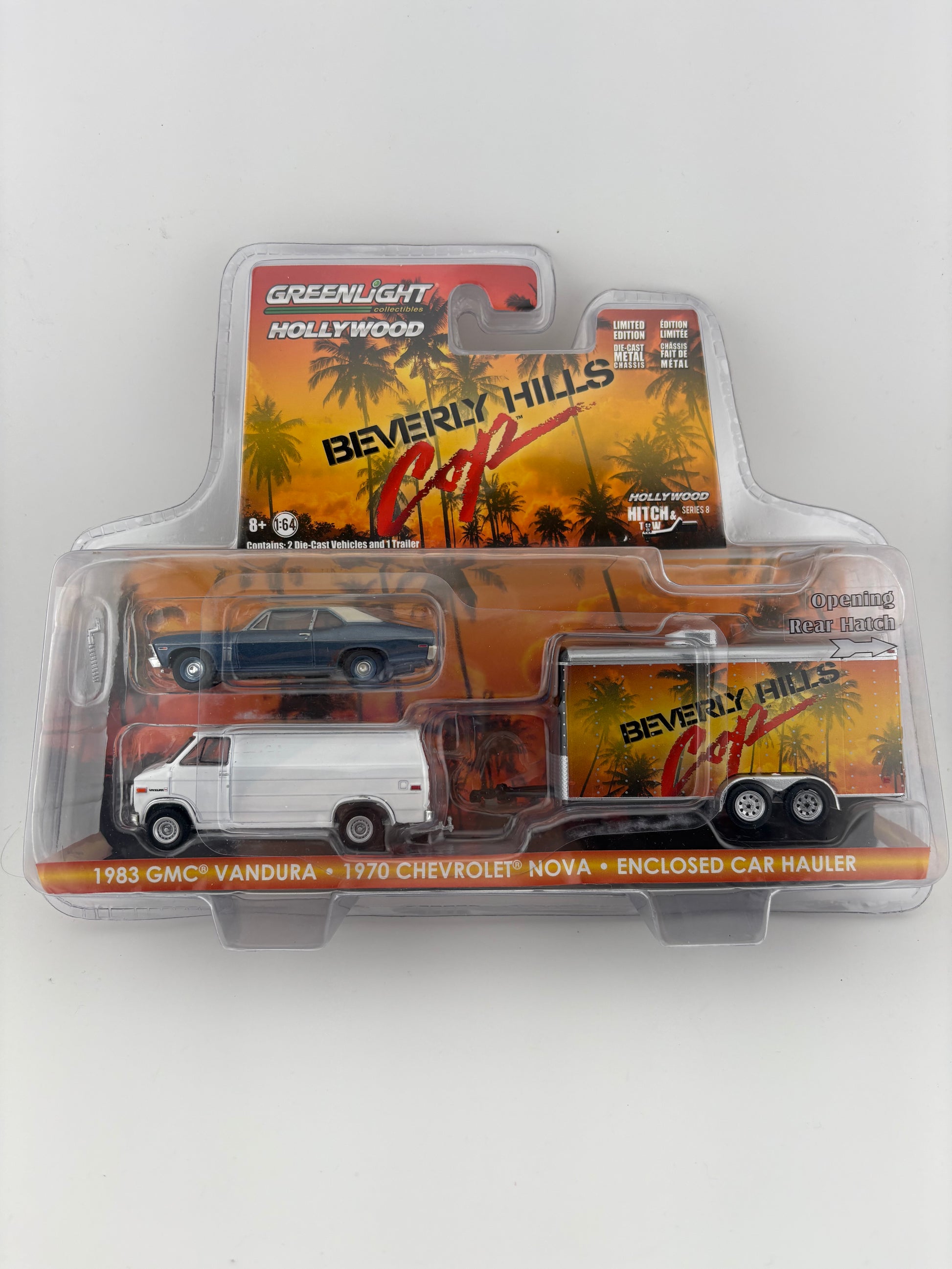 GreenLight Hollywood Hitch & Tow Series 8 – Beverly Hills Cop (1984) – 1983 GMC Vandura, 1970 Chevrolet Nova & Enclosed Car Hauler