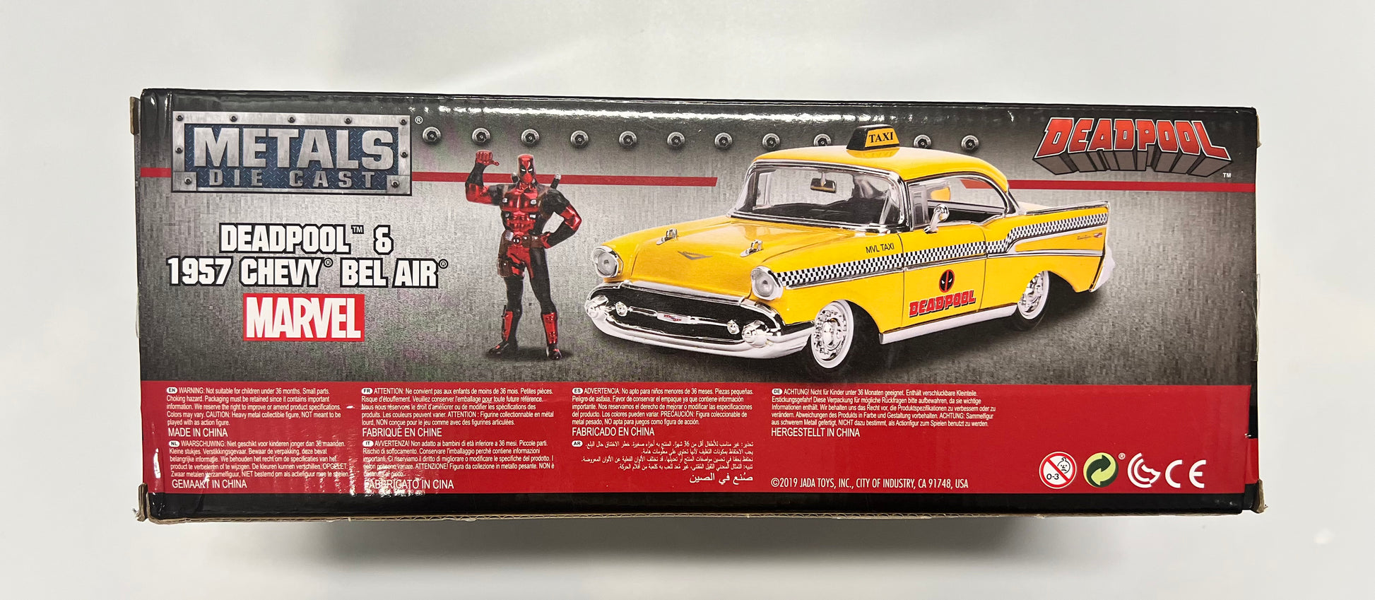 Jada 1957 Chevrolet Bel Air Taxi Yellow with Deadpool Die-cast Figure Marvel Series 1:24 scale