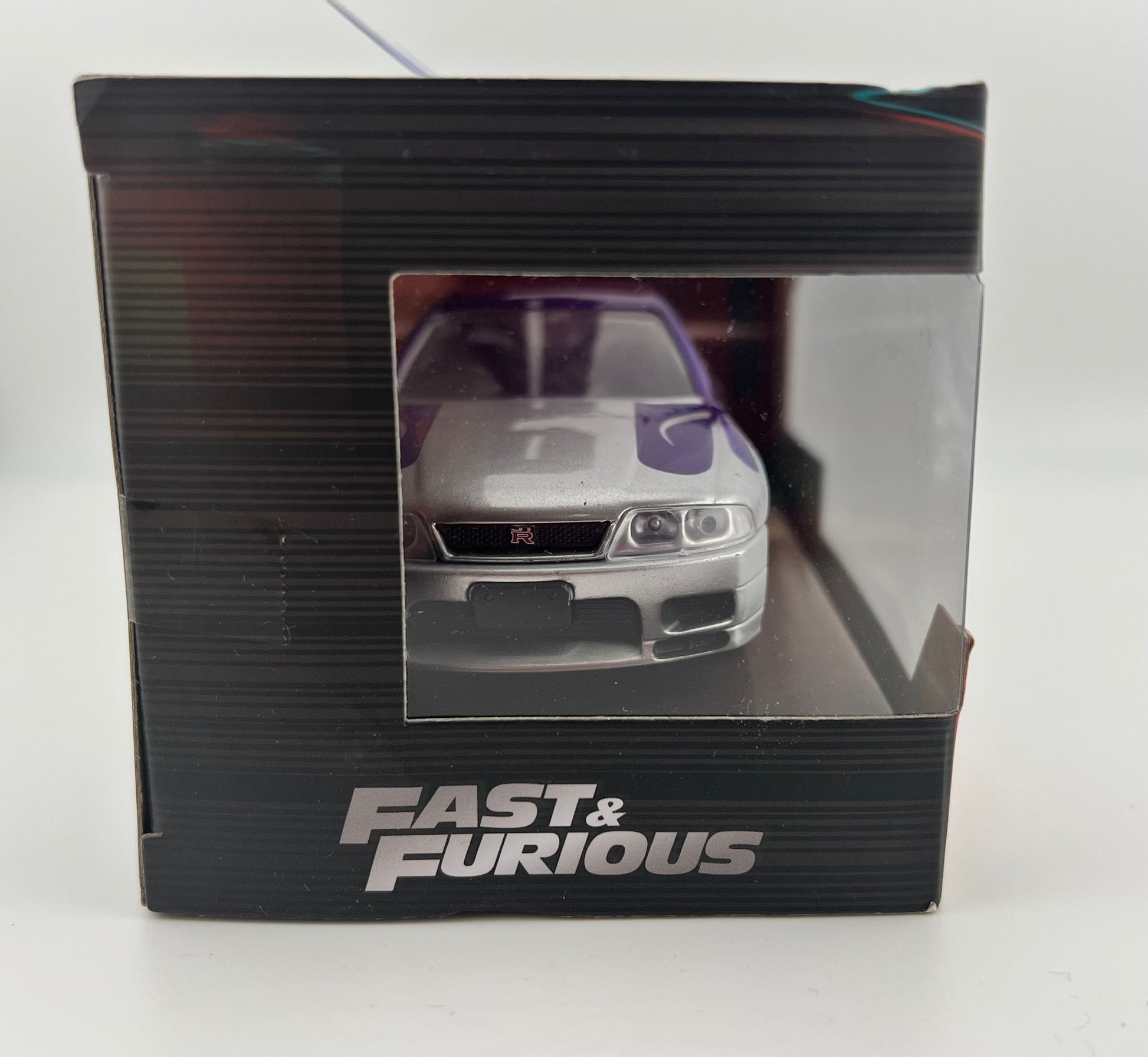 Jada 1995 NISSAN SKYLINE GT-R BCNR33 PURPLE & SILVER "FAST & FURIOUS" 1:32 Scale Fishwheels