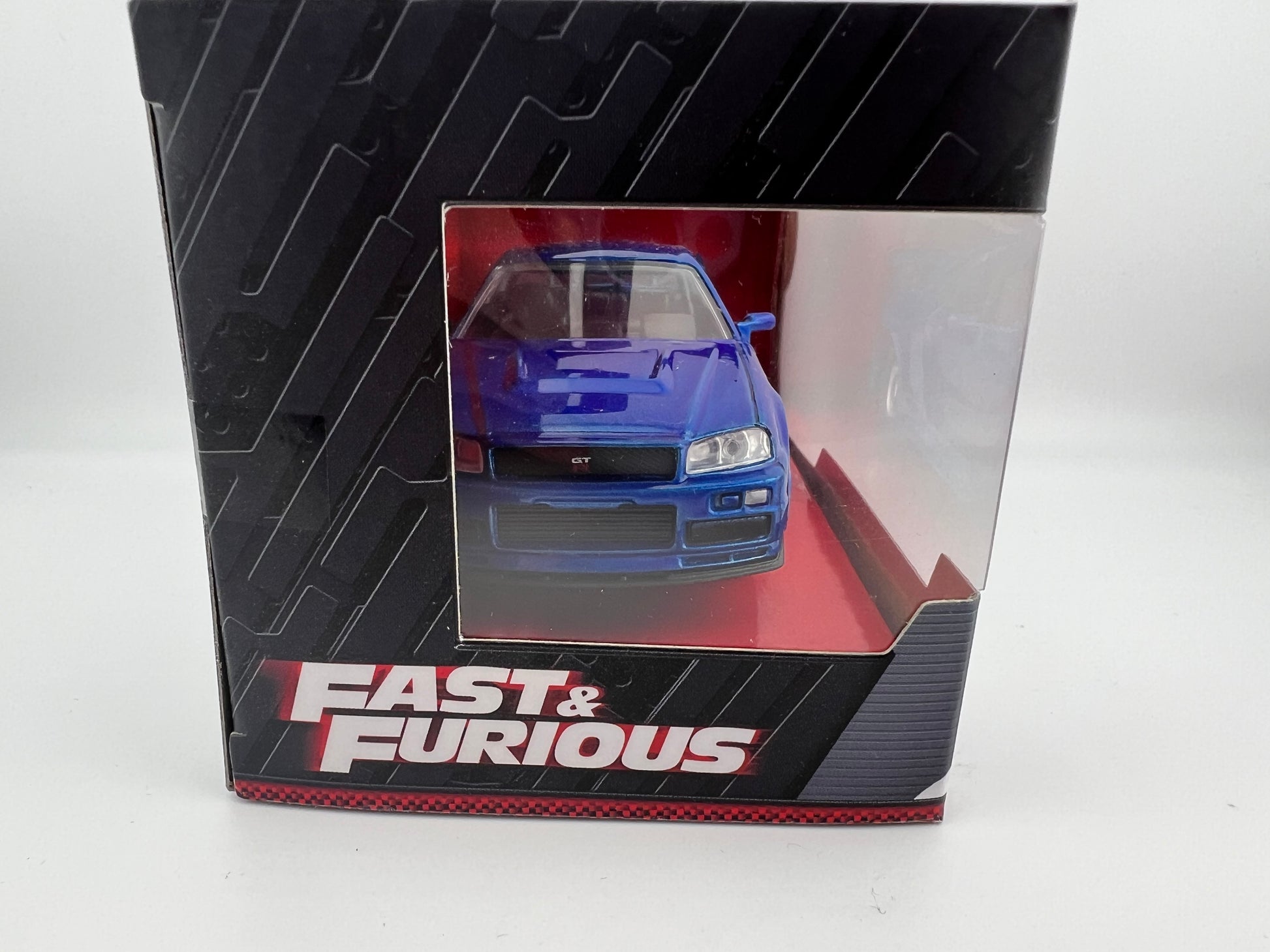 Jada Brian's Nissan Skyline GT-R (BNR34) Blue Fast & Furious 1:32 (Blue) Fishwheels